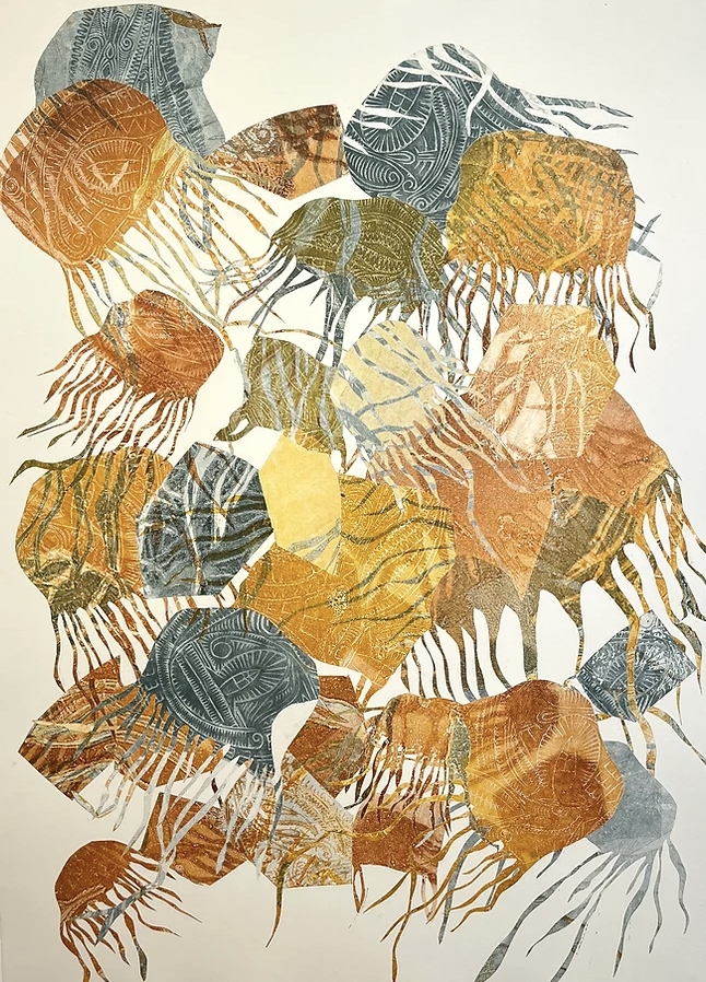 A monoprint in warm oranges and blues shows overlapping patterned jellyfish