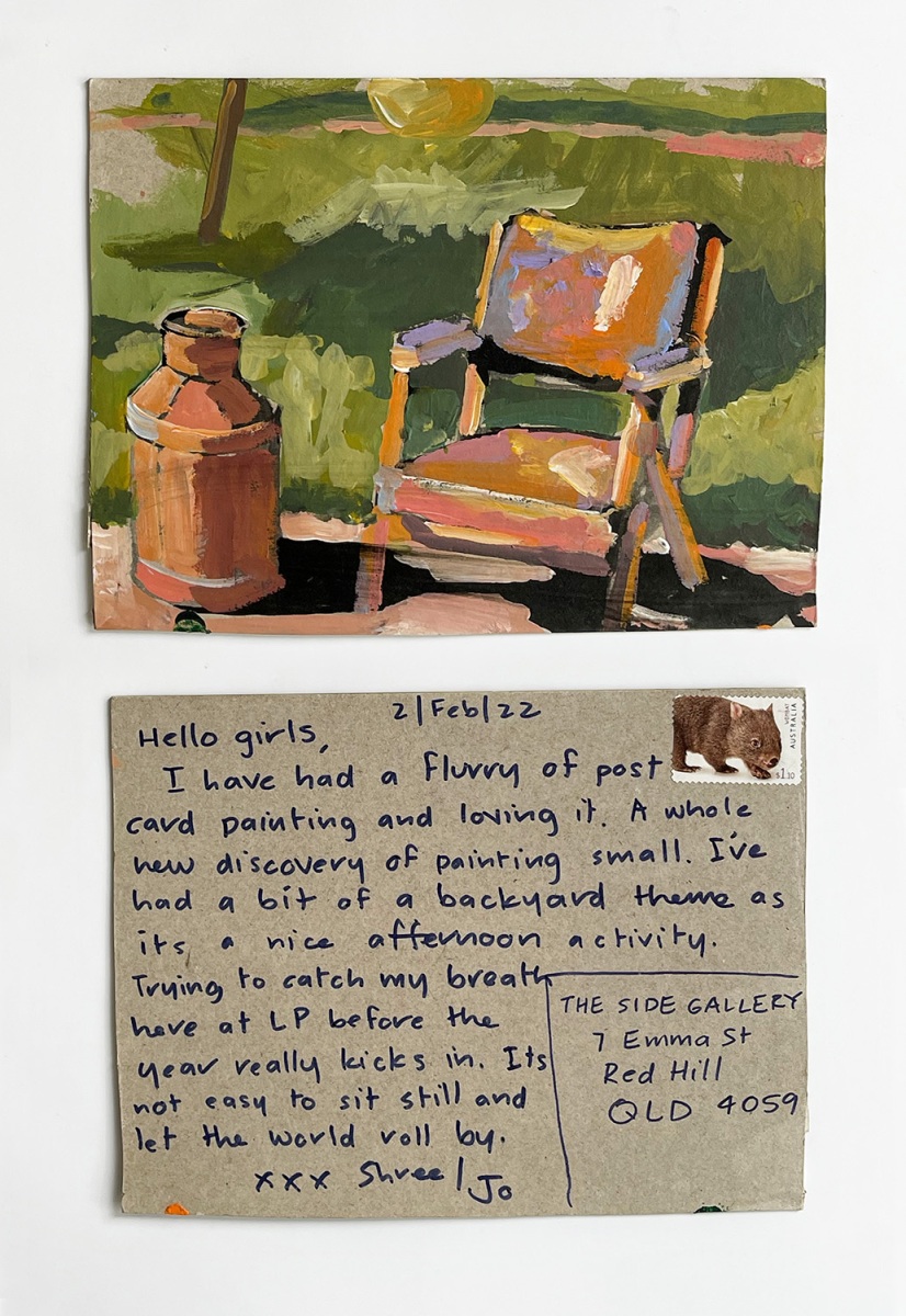 A composite photograph depicts two sides of a brown cardboard postcard. At the left is a painting of a folding chair in a green yard, below is a message about painting small and afternoons